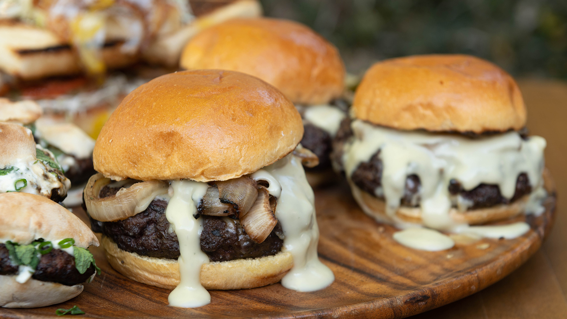 Brisket Burger with Grilled Onions and Blue Cheese Sauce Tastemade